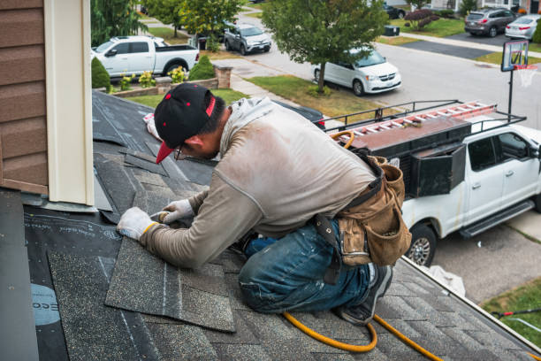 Professional Roofing technician working in Harveysburg, OH
